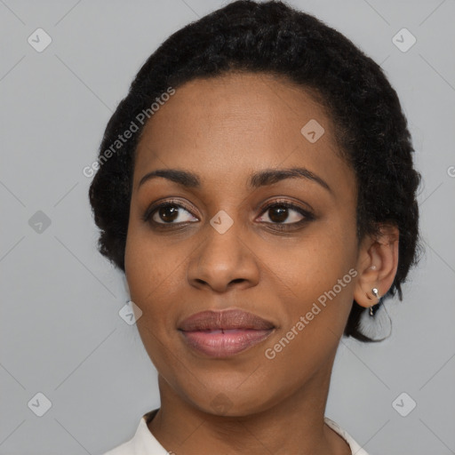 Joyful black young-adult female with medium  black hair and brown eyes