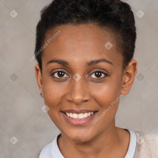 Joyful black young-adult female with short  brown hair and brown eyes