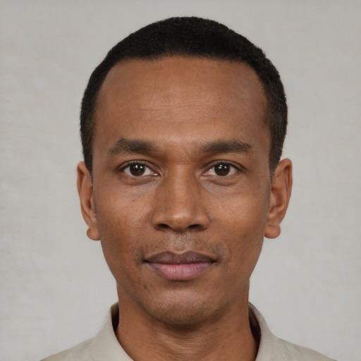 Neutral black young-adult male with short  black hair and brown eyes
