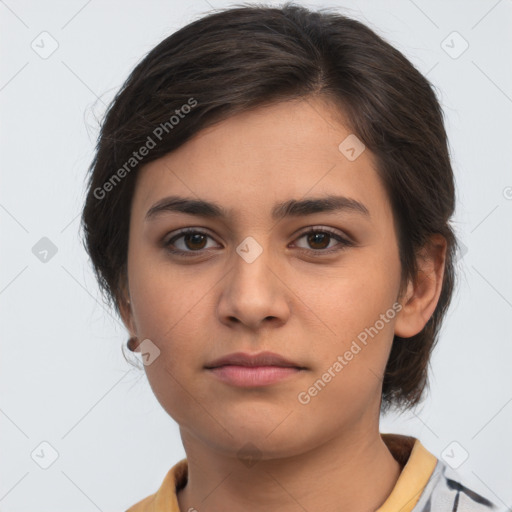 Neutral white young-adult female with short  brown hair and brown eyes