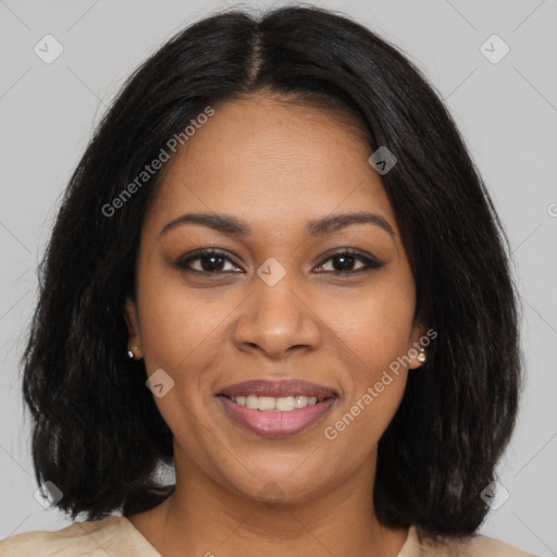 Joyful black young-adult female with long  brown hair and brown eyes