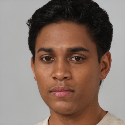 Neutral black young-adult male with short  black hair and brown eyes
