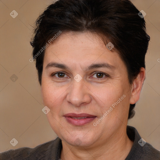 Joyful white adult female with short  brown hair and brown eyes