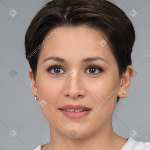 Joyful white young-adult female with short  brown hair and brown eyes