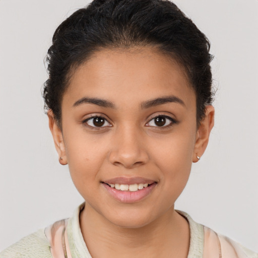 Joyful latino young-adult female with short  brown hair and brown eyes