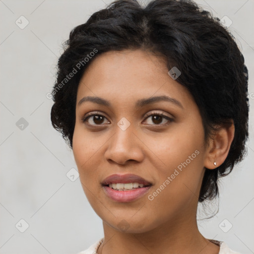 Joyful latino young-adult female with short  brown hair and brown eyes