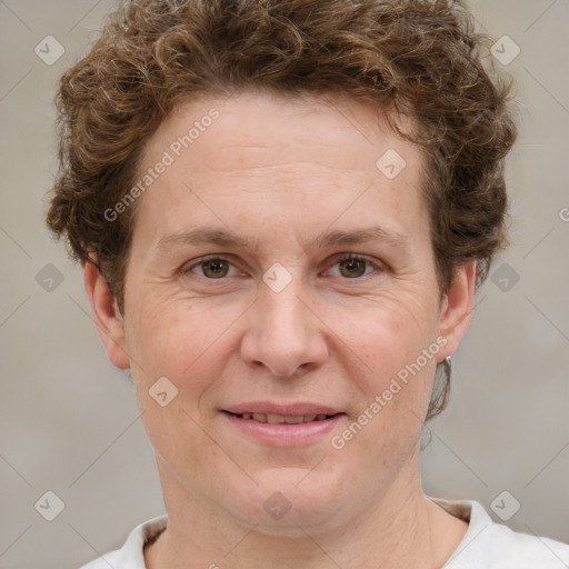 Joyful white adult female with short  brown hair and brown eyes