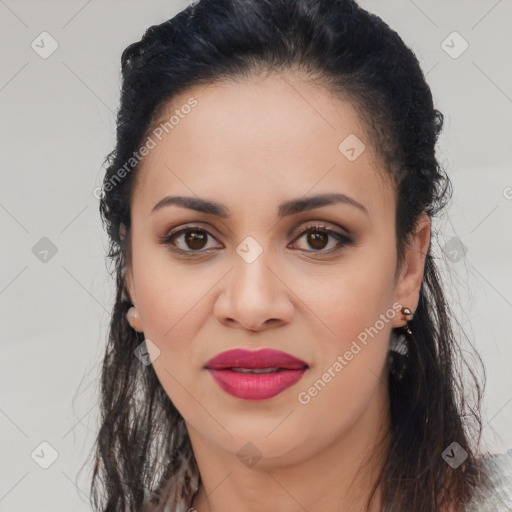 Joyful latino young-adult female with long  brown hair and brown eyes