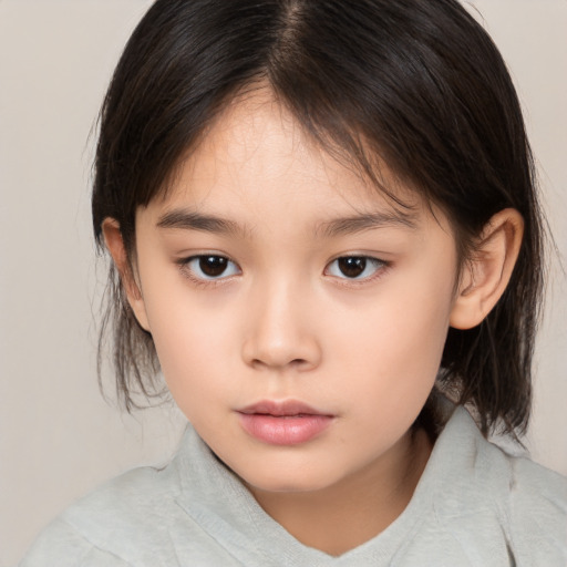 Neutral asian child female with medium  brown hair and brown eyes