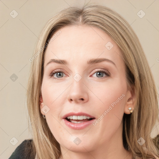 Joyful white young-adult female with medium  brown hair and blue eyes