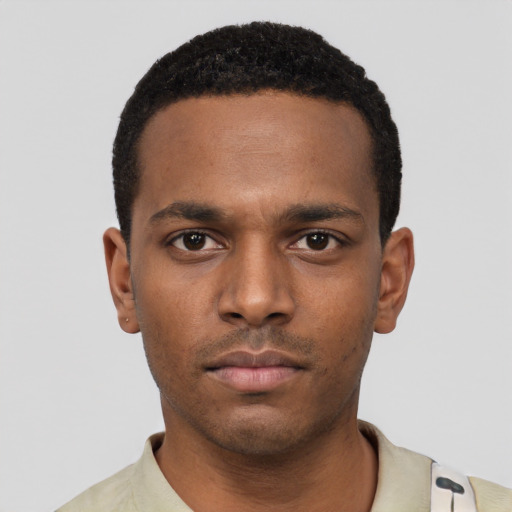 Neutral black young-adult male with short  black hair and brown eyes