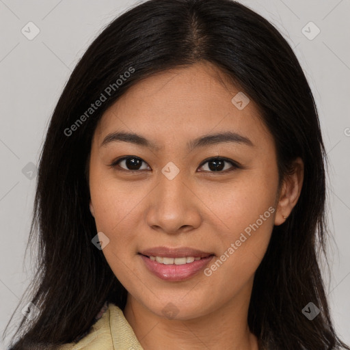 Joyful latino young-adult female with long  brown hair and brown eyes