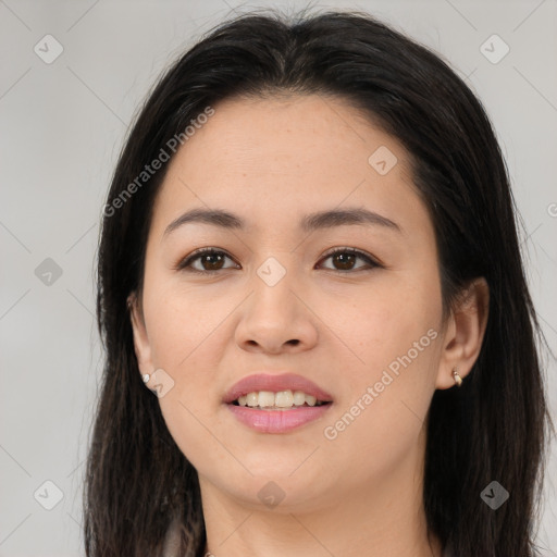 Joyful asian young-adult female with long  brown hair and brown eyes