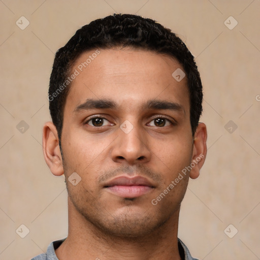 Neutral latino young-adult male with short  black hair and brown eyes