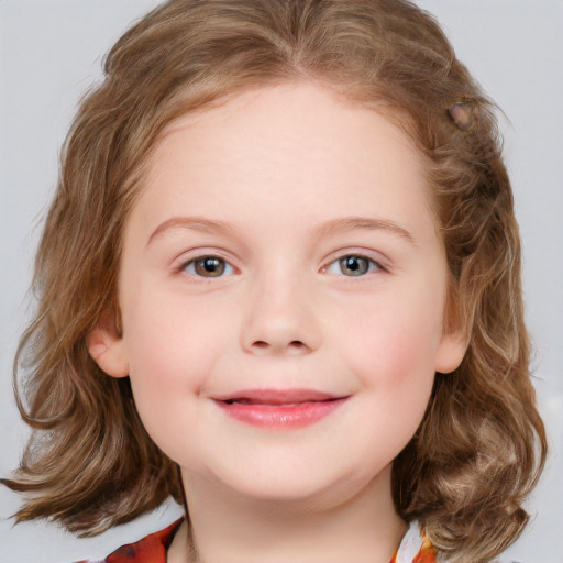 Joyful white child female with medium  brown hair and blue eyes