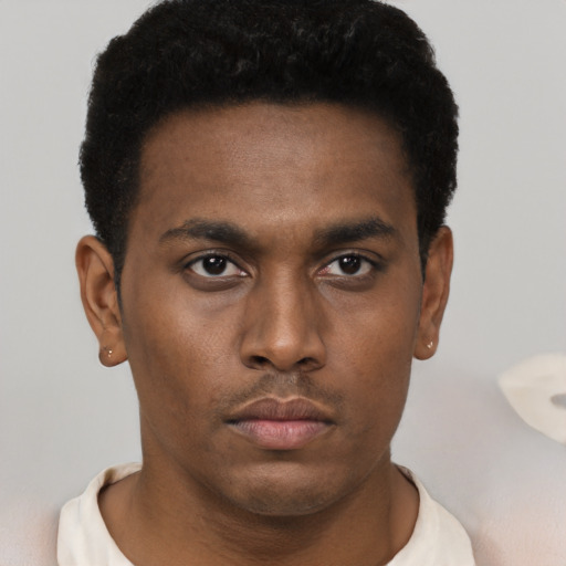 Neutral black young-adult male with short  brown hair and brown eyes