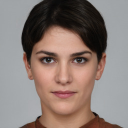 Neutral white young-adult female with short  brown hair and brown eyes