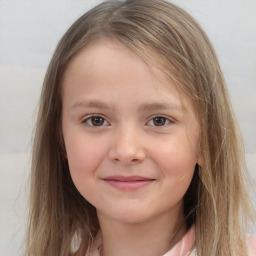 Joyful white child female with long  brown hair and brown eyes