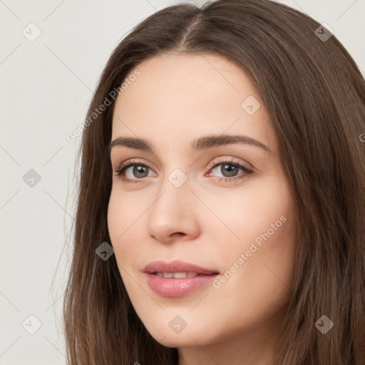 Neutral white young-adult female with long  brown hair and brown eyes