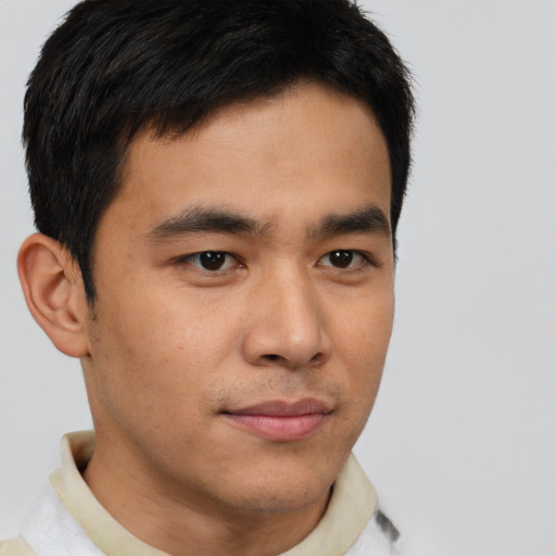 Neutral asian young-adult male with short  brown hair and brown eyes
