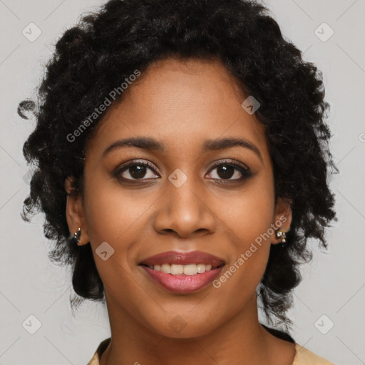 Joyful black young-adult female with long  brown hair and brown eyes