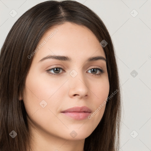 Neutral white young-adult female with long  brown hair and brown eyes