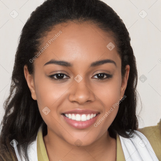 Joyful latino young-adult female with long  brown hair and brown eyes