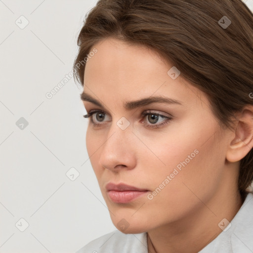 Neutral white young-adult female with short  brown hair and brown eyes