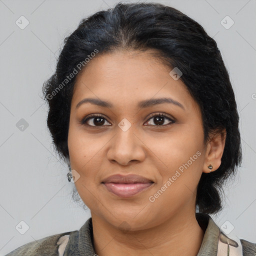 Joyful latino young-adult female with medium  black hair and brown eyes