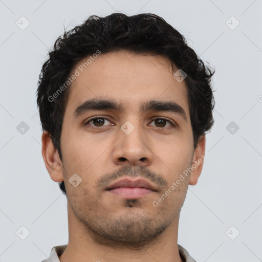 Neutral latino young-adult male with short  brown hair and brown eyes