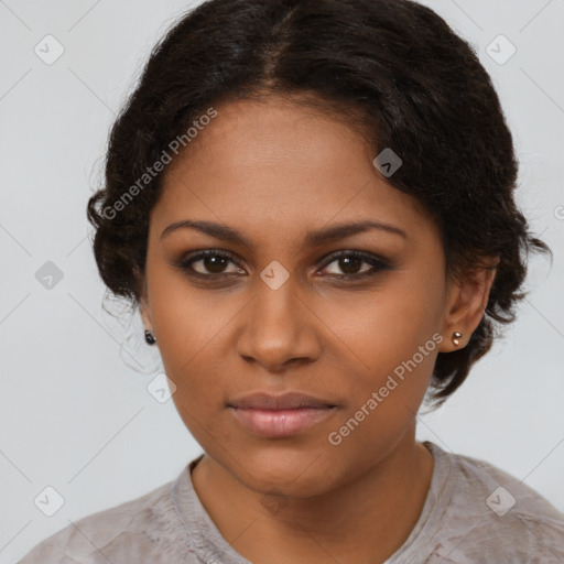 Neutral black young-adult female with medium  brown hair and brown eyes