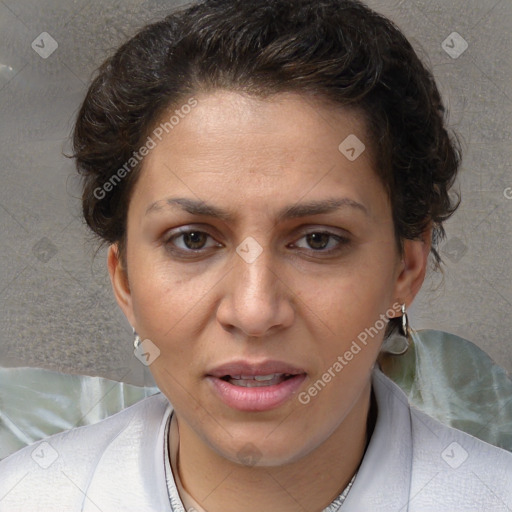 Joyful white adult female with short  brown hair and brown eyes