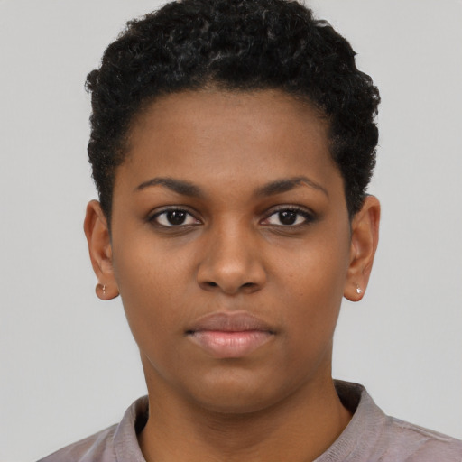 Neutral black young-adult female with short  black hair and brown eyes