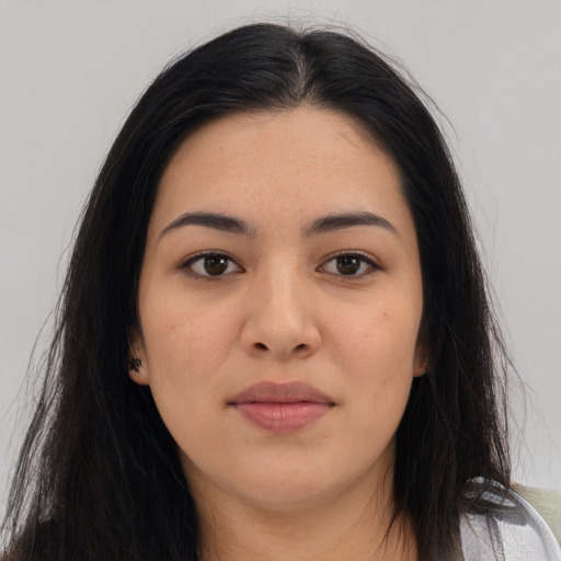 Joyful asian young-adult female with long  brown hair and brown eyes