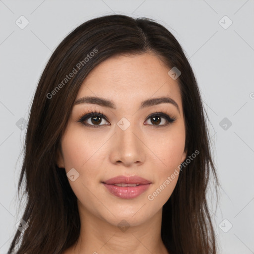 Joyful asian young-adult female with long  brown hair and brown eyes