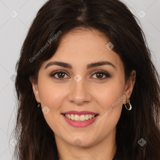 Joyful white young-adult female with long  brown hair and brown eyes