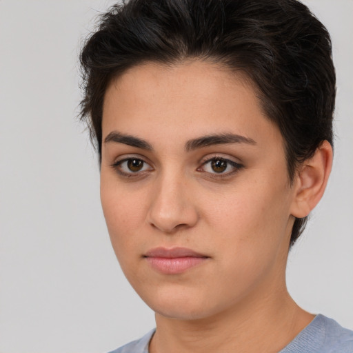 Neutral white young-adult female with short  brown hair and brown eyes
