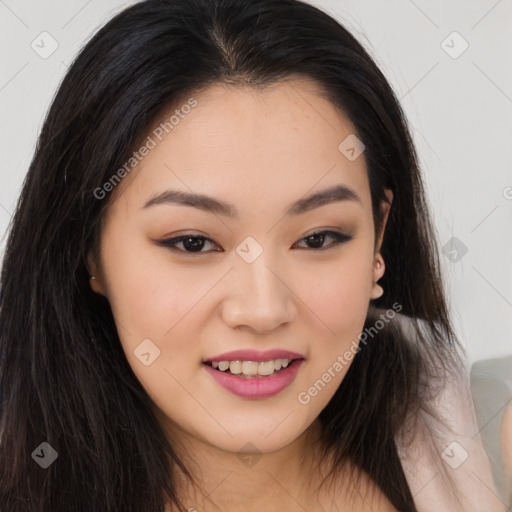 Joyful asian young-adult female with long  brown hair and brown eyes