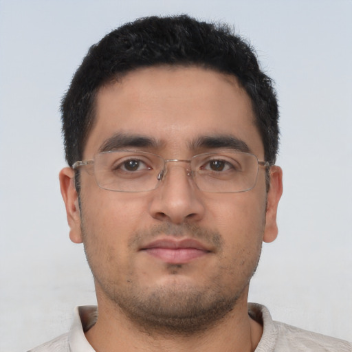 Neutral latino young-adult male with short  brown hair and brown eyes