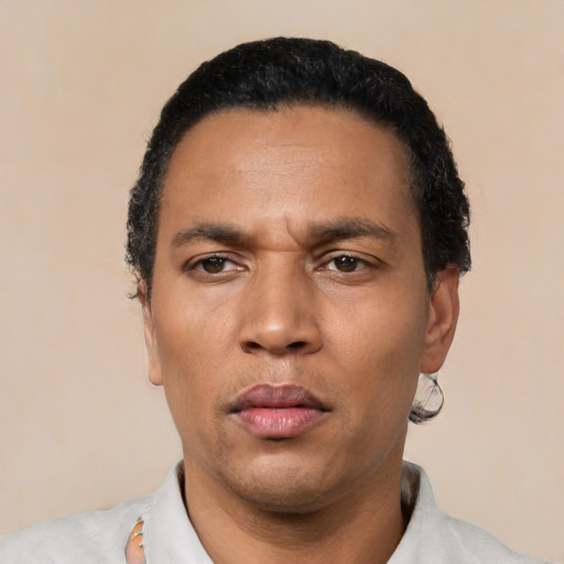 Neutral latino adult male with short  black hair and brown eyes