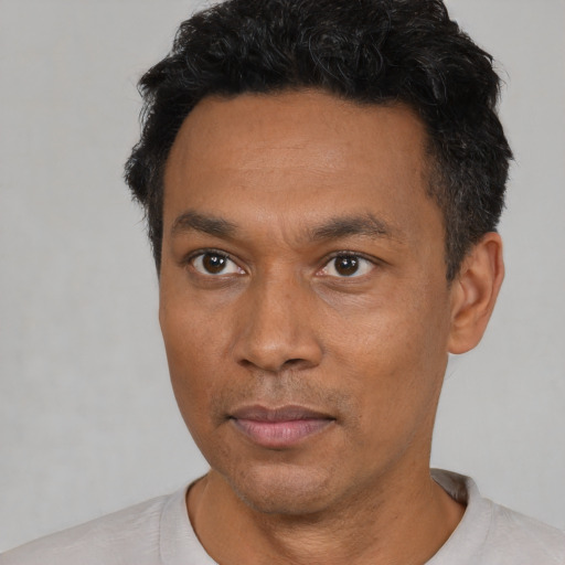 Neutral asian adult male with short  black hair and brown eyes