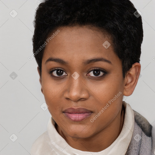 Joyful black young-adult female with short  brown hair and brown eyes