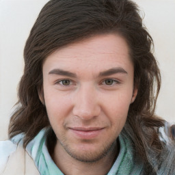 Joyful white young-adult male with medium  brown hair and brown eyes