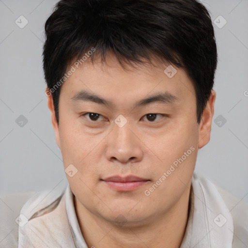 Neutral asian young-adult male with short  brown hair and brown eyes