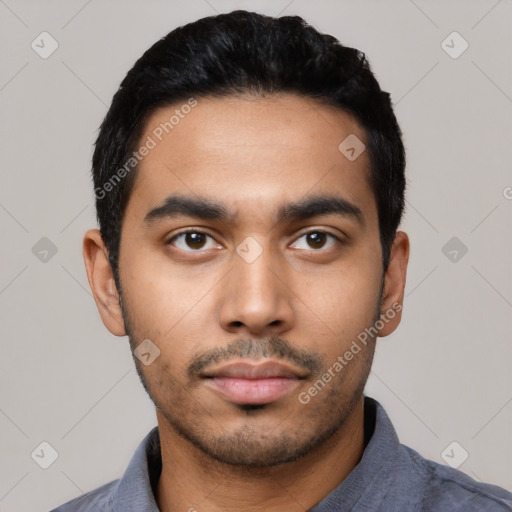 Neutral latino young-adult male with short  black hair and brown eyes