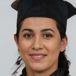 Joyful latino young-adult female with medium  black hair and brown eyes