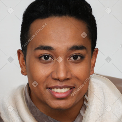 Joyful latino young-adult male with short  brown hair and brown eyes