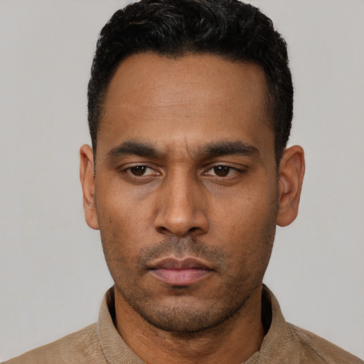 Neutral latino young-adult male with short  black hair and brown eyes