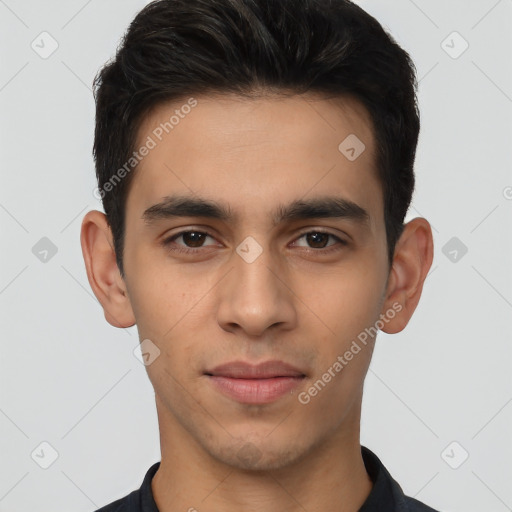 Joyful latino young-adult male with short  brown hair and brown eyes