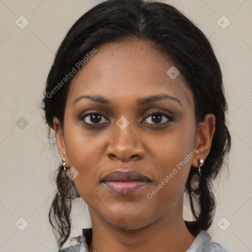 Joyful black young-adult female with medium  black hair and brown eyes
